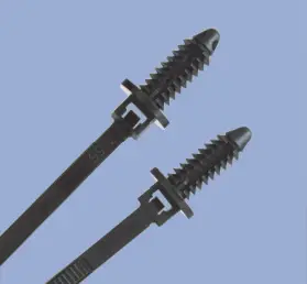 The tips of two fir tree cable ties